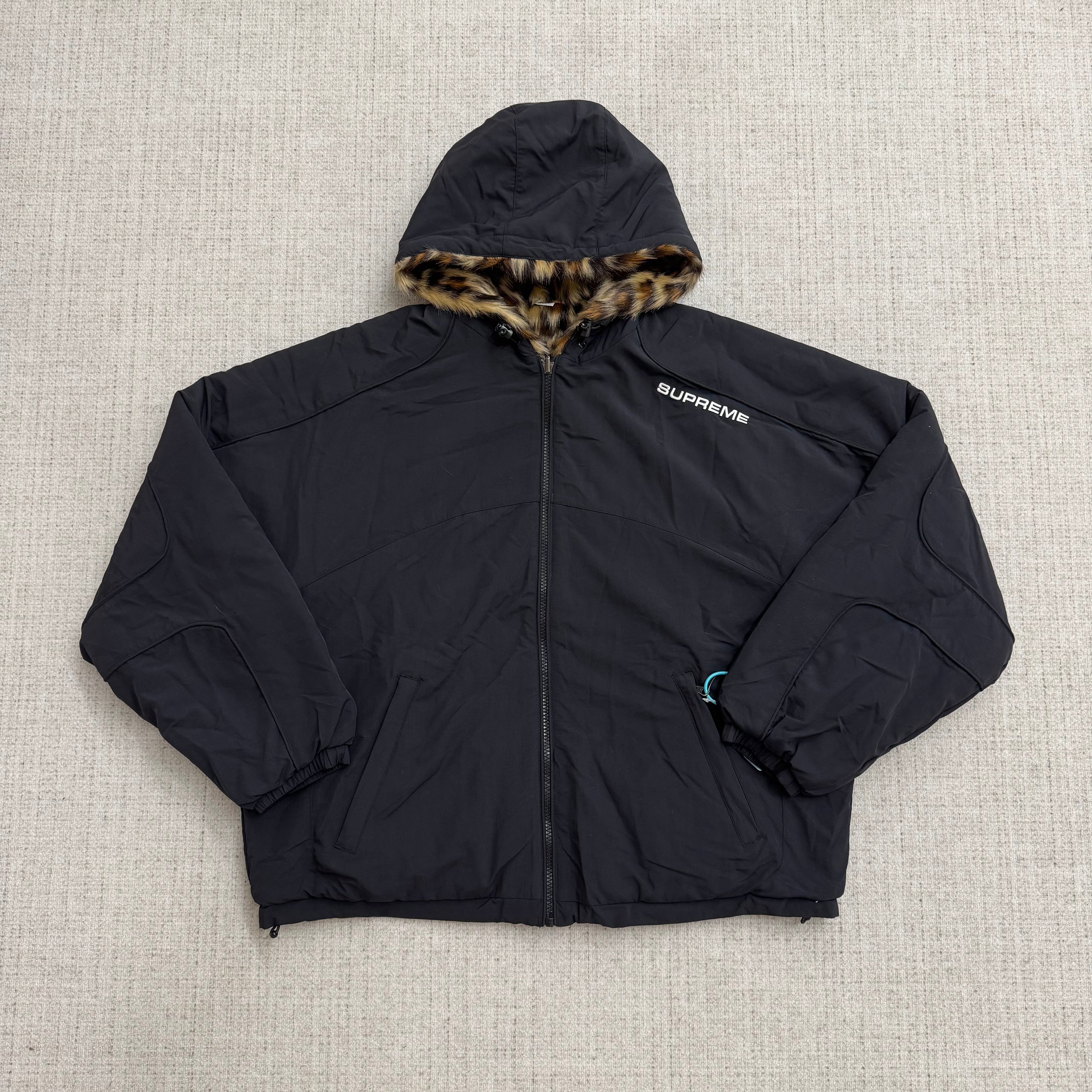 Supreme Kunstpelz Wende Trainingsjacke mit Kaupze